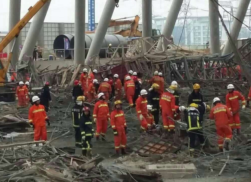 Rescue workers at the accident site at the Fengcheng power plant in Yichun City, China's Jiangxi province