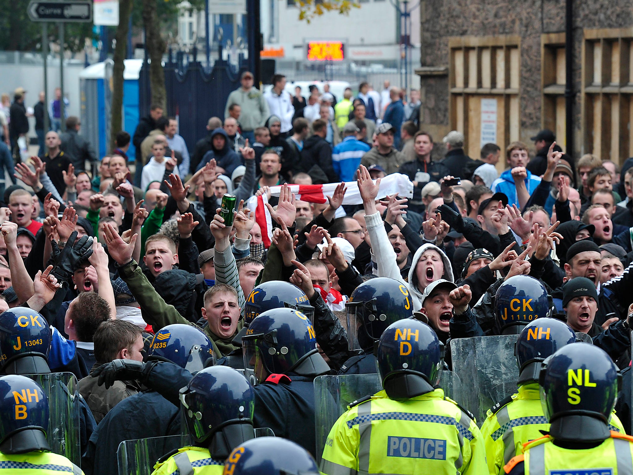 Members of the English Defence League (EDL) gather for a protest in Leicester city centre, England, on 9 October, 2010