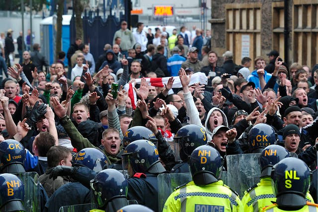 Members of the English Defence League (EDL) gather for a protest in Leicester city centre, England, on 9 October, 2010