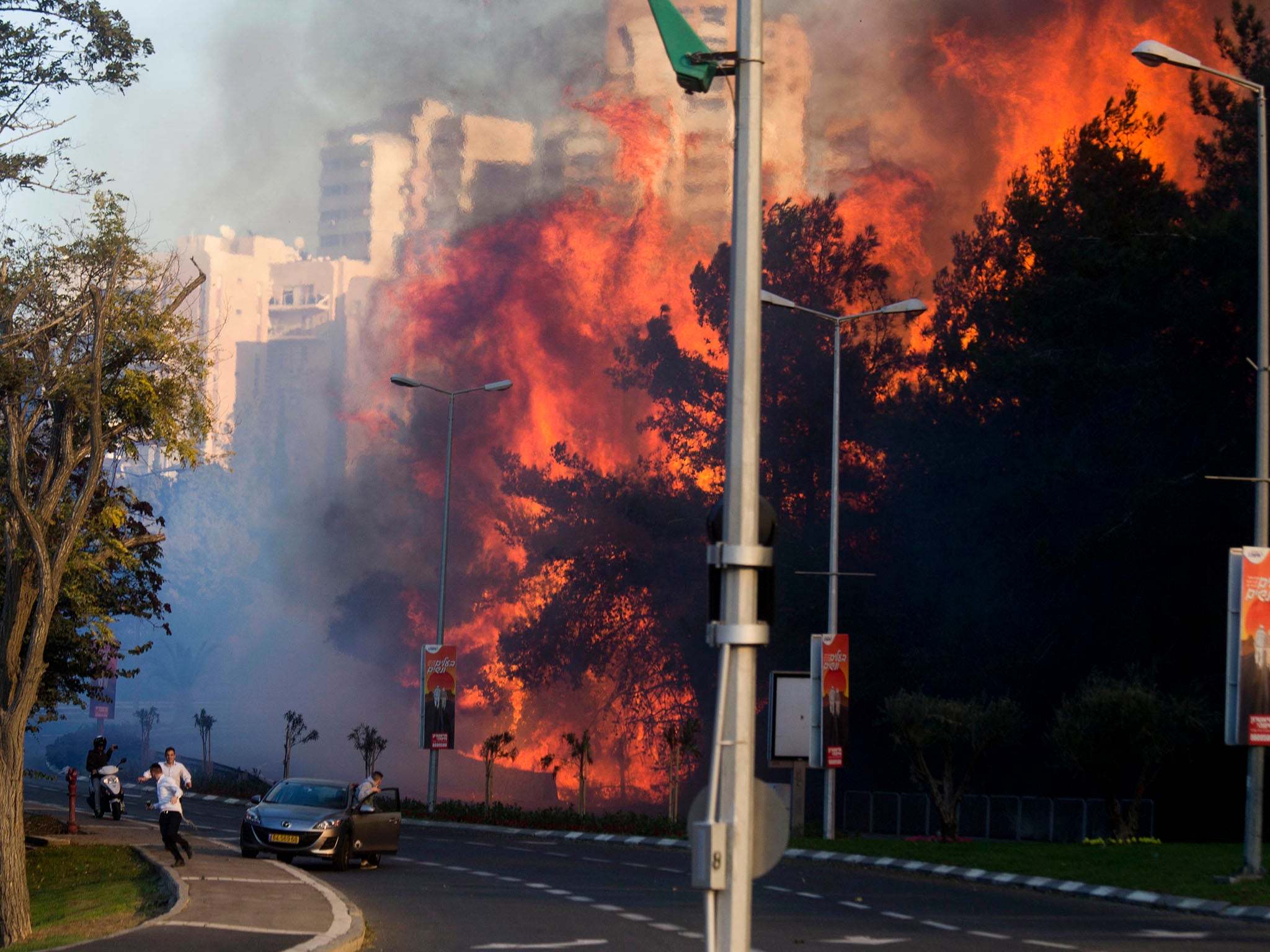 Wildfires raging through Haifa have forced over 80,000 to be evacuated and prompted international action to help stop the flames