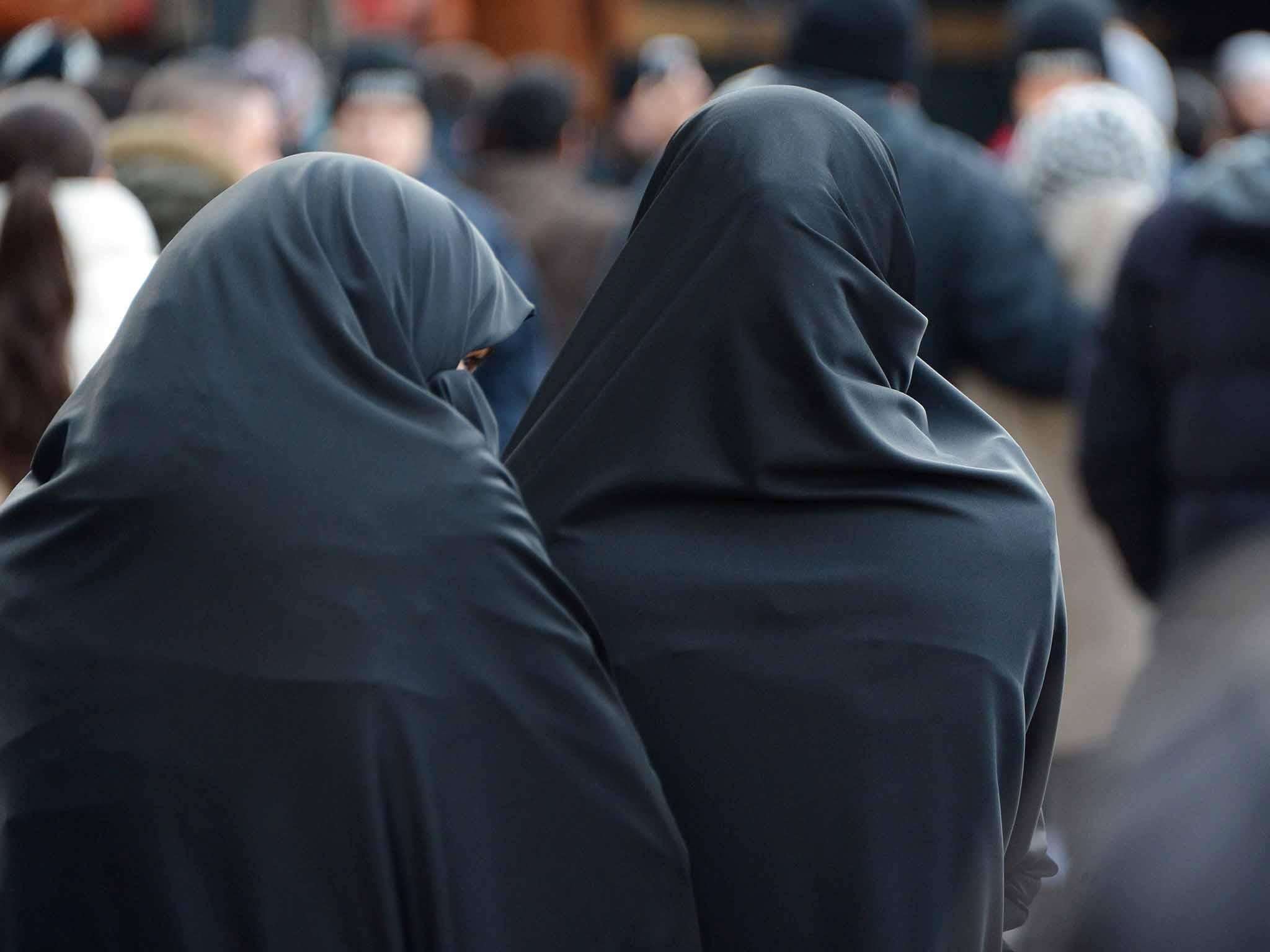 The deal included a ban on Muslim veils such as the burka and niqab, which cover all or most of the face