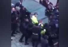 Moment 30 teenagers attack police officers caught on camera