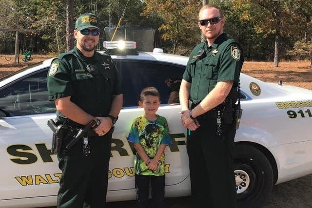 The boy, named only as Billy, was allowed to sit in the deputies' patrol car