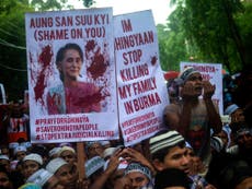 Suu Kyi 'burying head in sand' over Rohingya 'horrors', says Amnesty