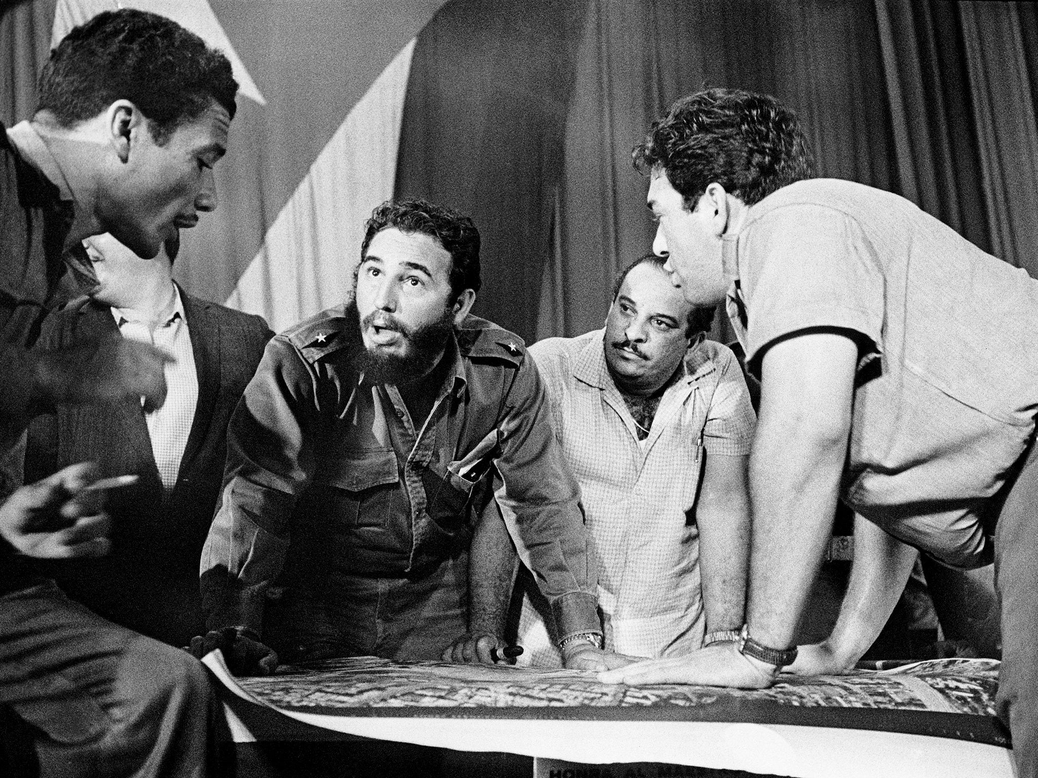 Castro with members of his government discussing strategy concerning the 'Bay of Pigs' invasion
