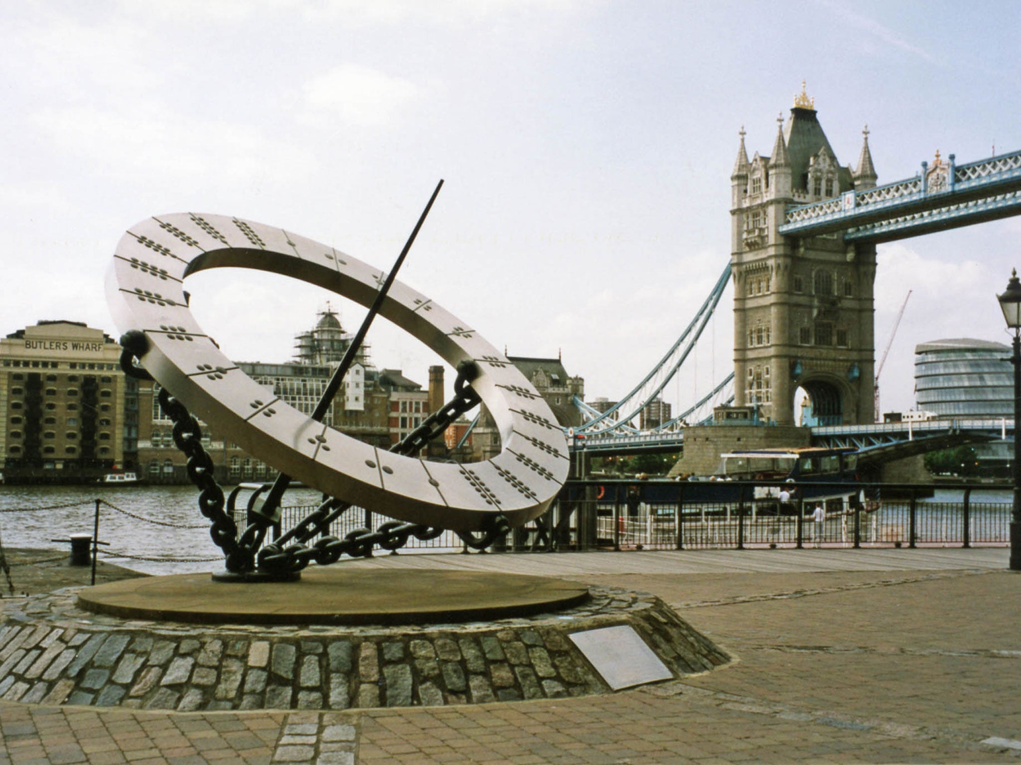 Wendy Taylor CBE's sculpture Timepiece seen by Tower Bridge in London