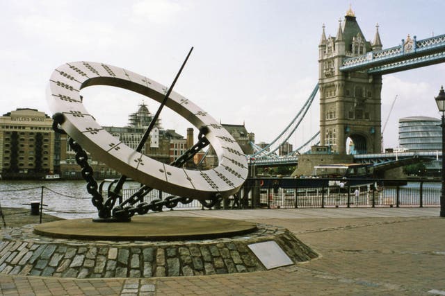 Wendy Taylor CBE's sculpture Timepiece seen by Tower Bridge in London