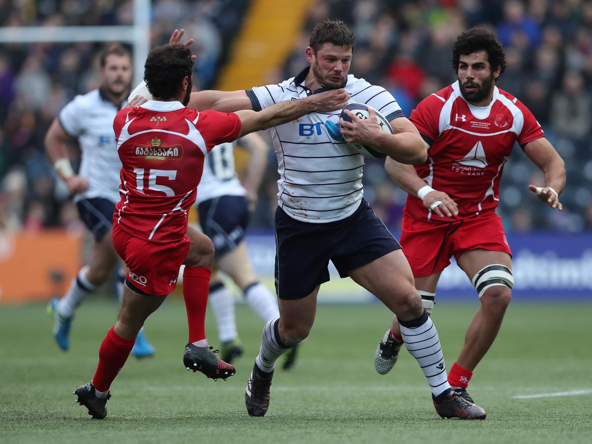 Ross Ford powers his way through the Georgian defence