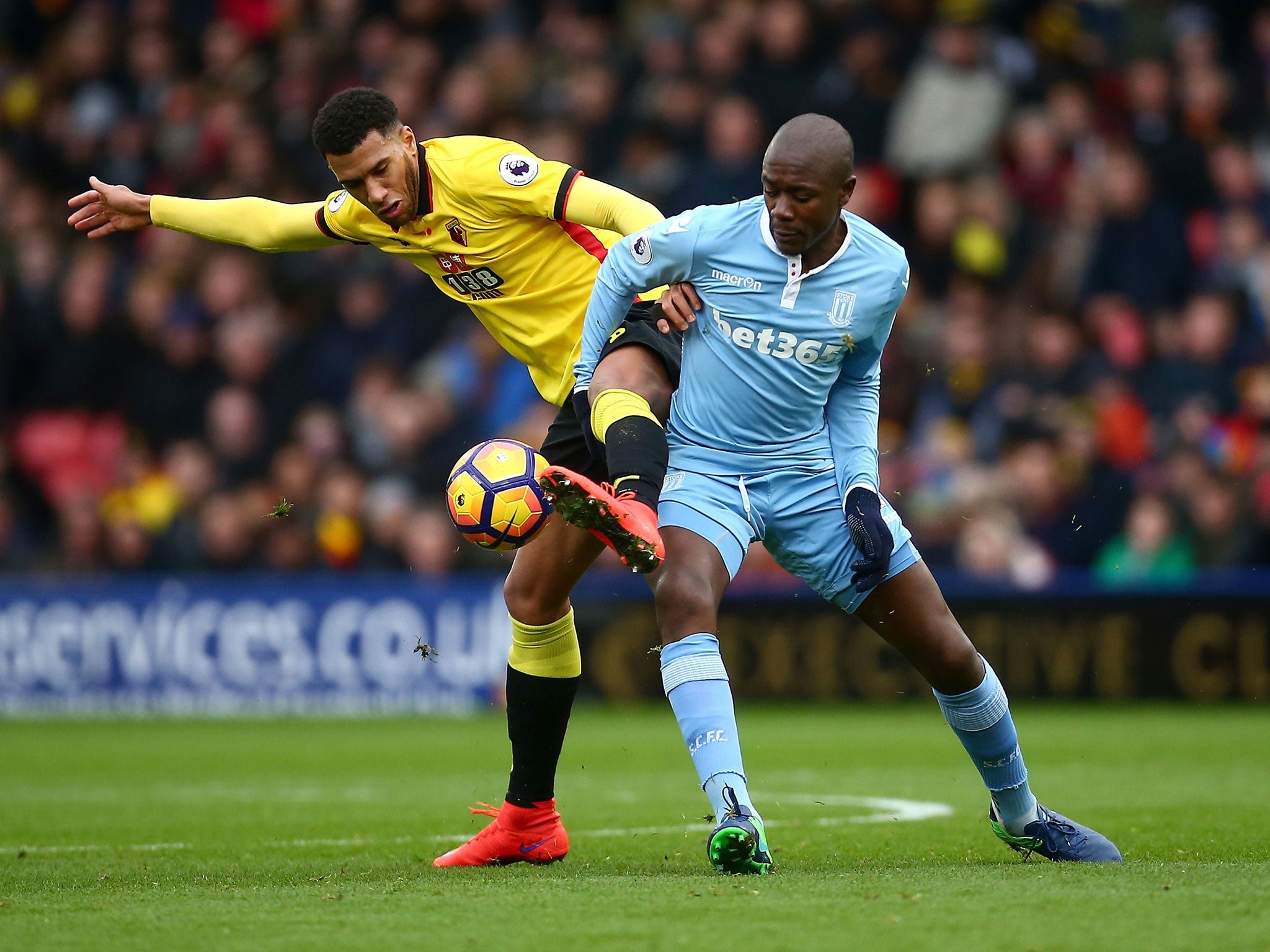 Etienne Capoue and Gianelli Imbula tussle for possession