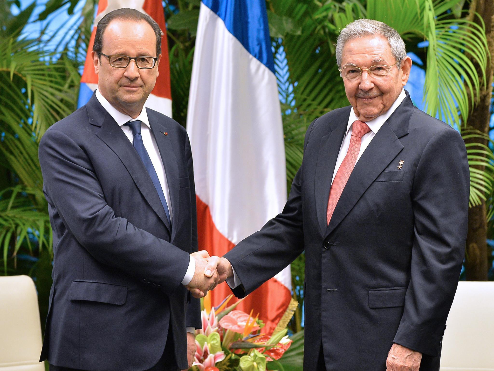 Francois Hollande (left) met Cuban president Raul Castro in Havana last year