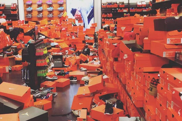 One customer described people "swimming through" orange boxes in search of deals