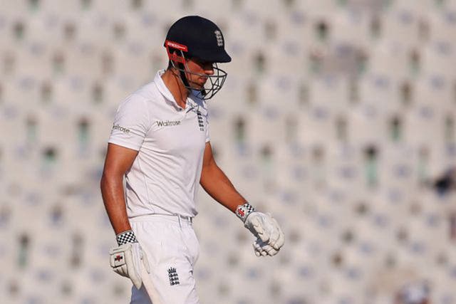 Alastair Cook walks off the pitch after being clean-bowled by Ravichandran Ashwin