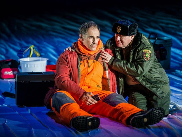 Mark Rylance as Ron (left) who joins a friend on a fishing trip and Bob Davis (right) as an officious DNR man in a scene from 'Nice Fish'