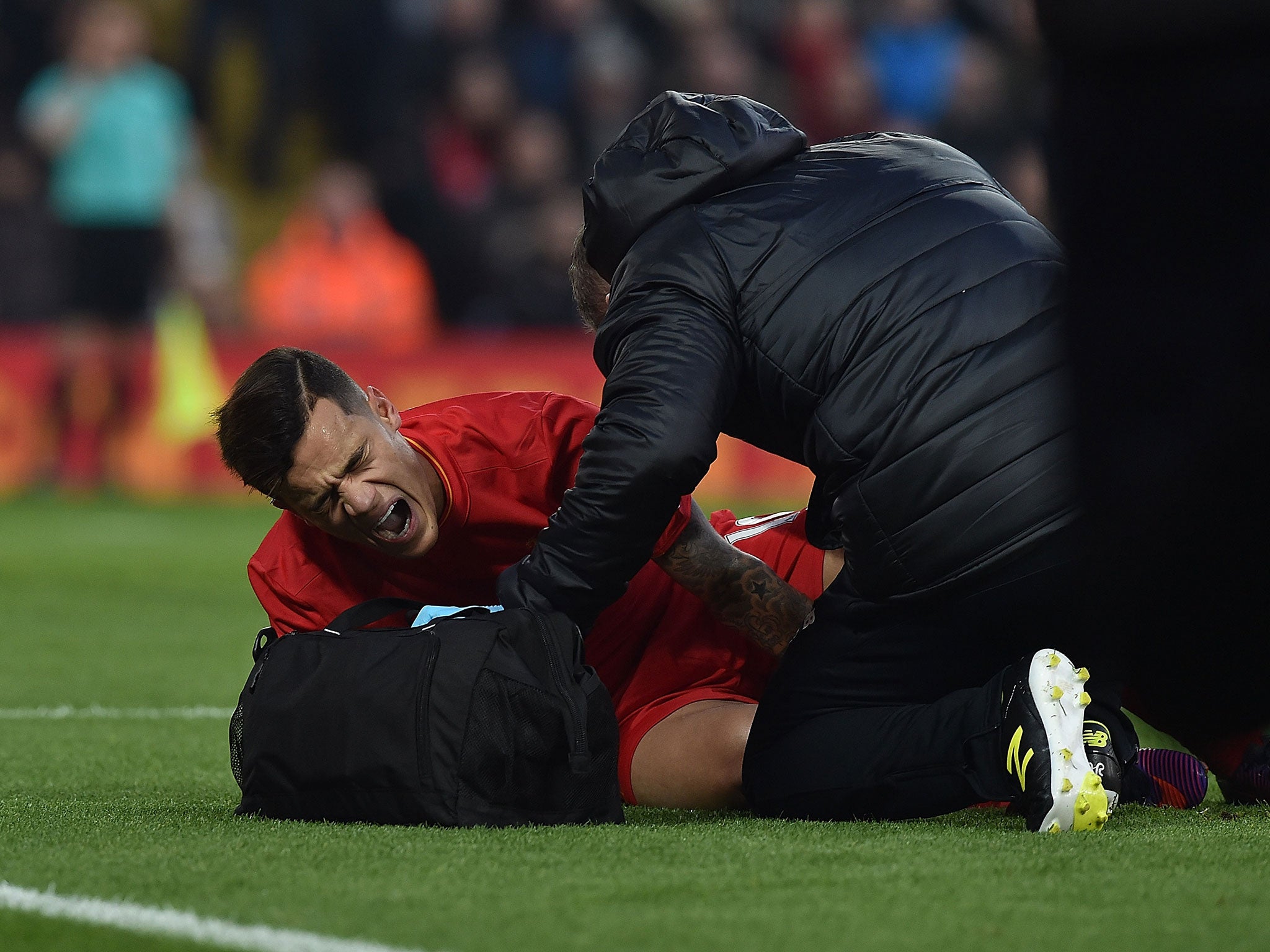 Coutinho had to be stretched off following his clash with Sunderland's Didier Ndong