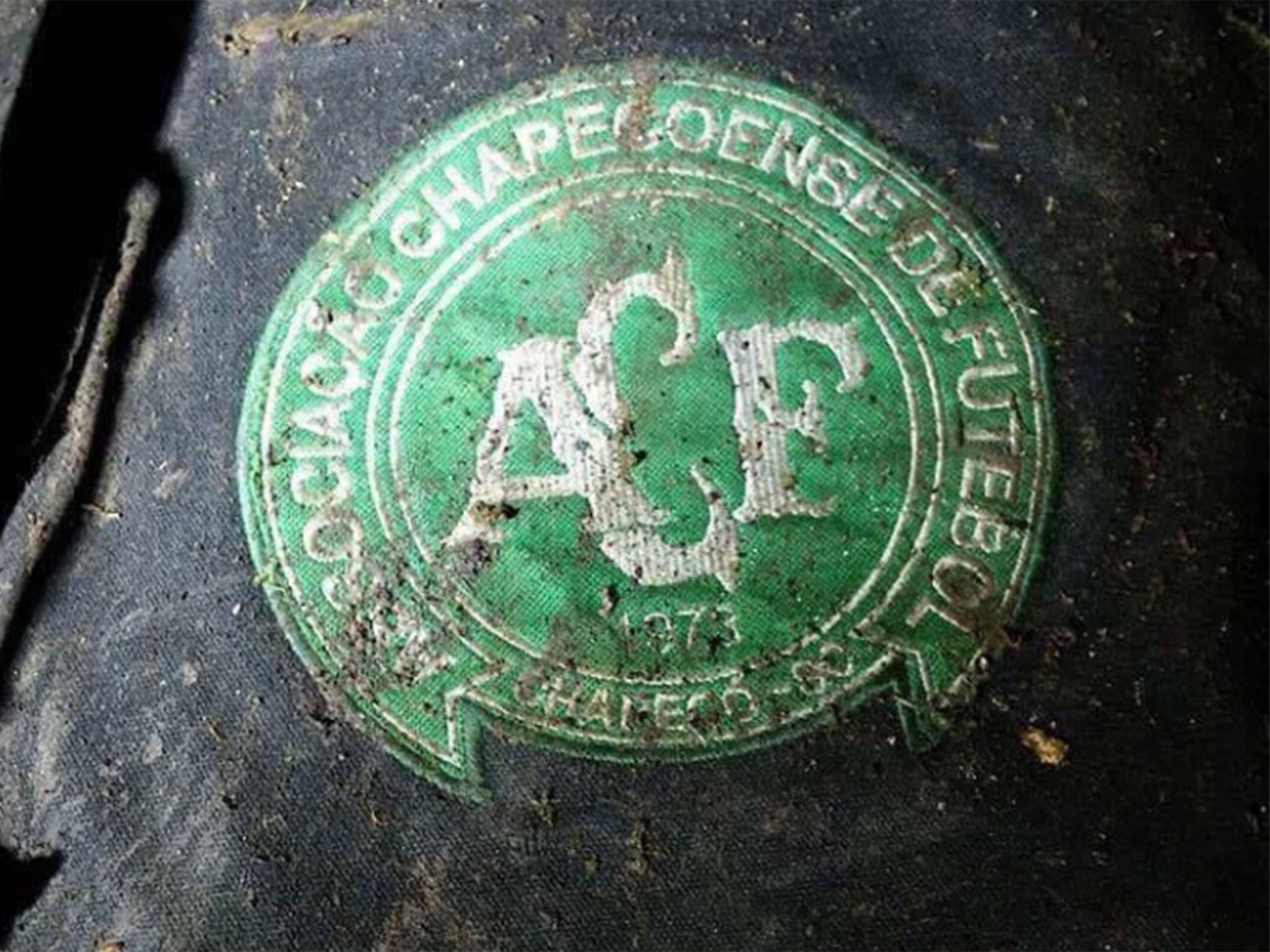 A Chapecoense badge reportedly found at the crash site