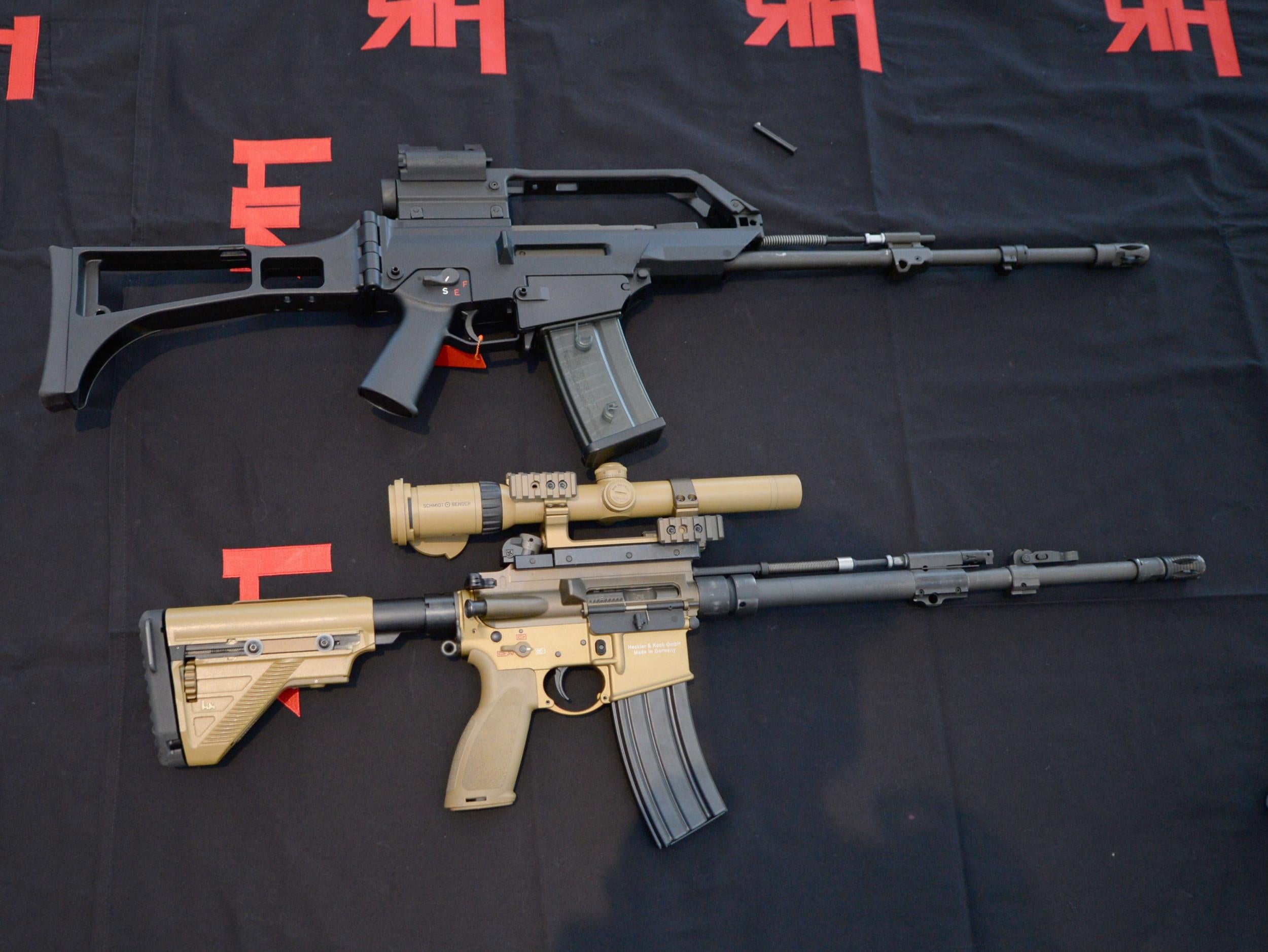 A G36 assault rifle (top) and a HK417-BW battle rifle made by German arms manufacturers Heckler & Koch