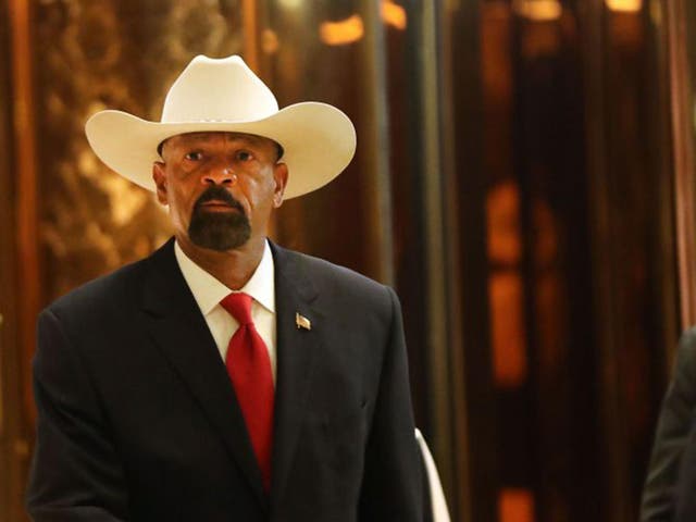 Milwaukee County Sheriff David Clarke leaves Trump Tower in New York City after a meeting with Donald Trump