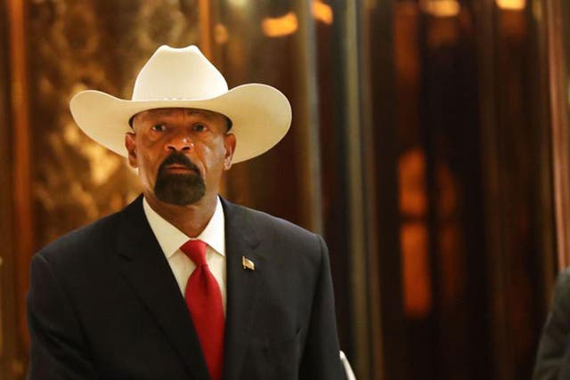 Milwaukee County Sheriff David Clarke leaves Trump Tower in New York City after a meeting with Donald Trump
