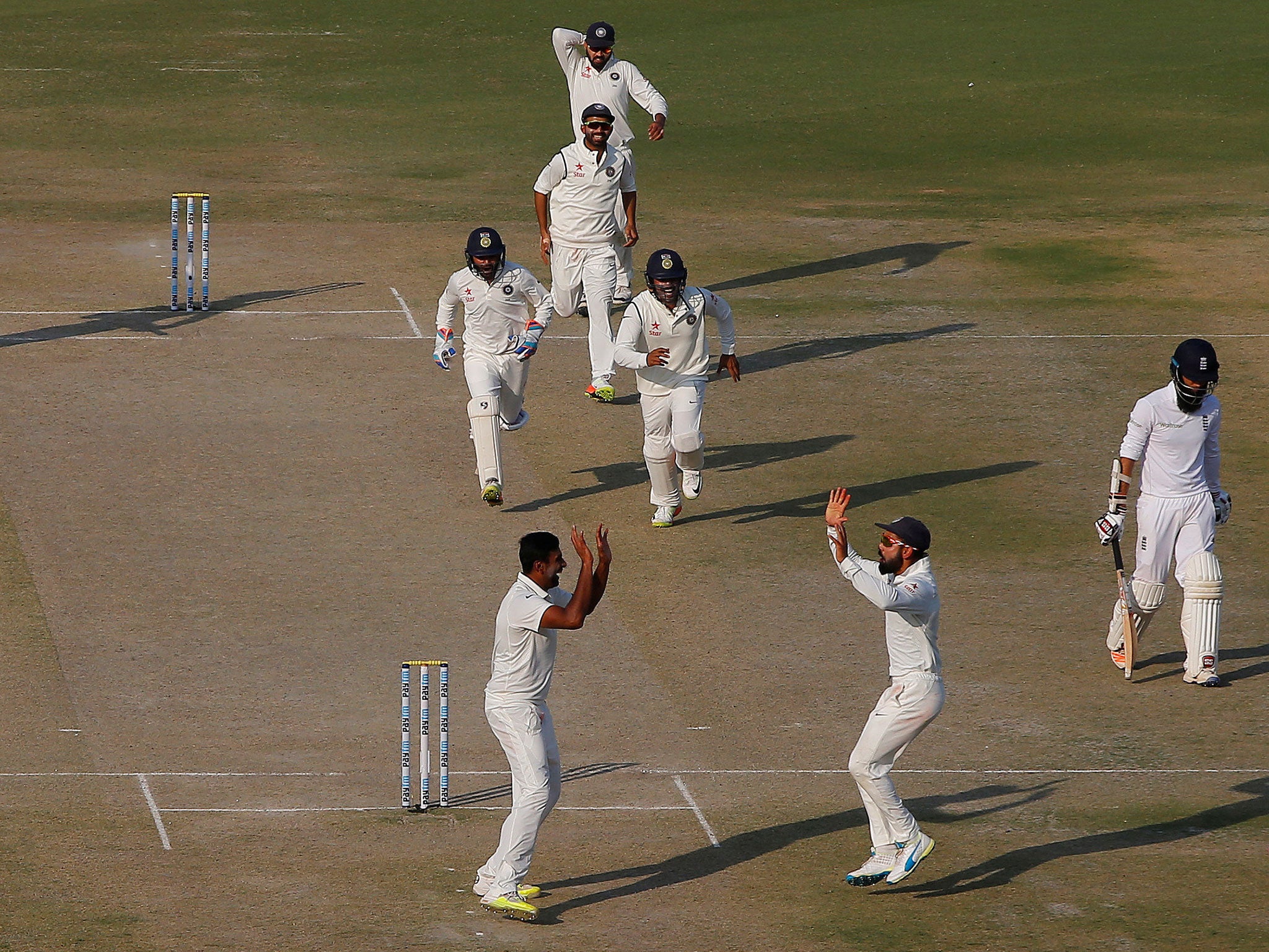 Moeen Ali takes his leave after being bowled by Ravichandran Ashwin