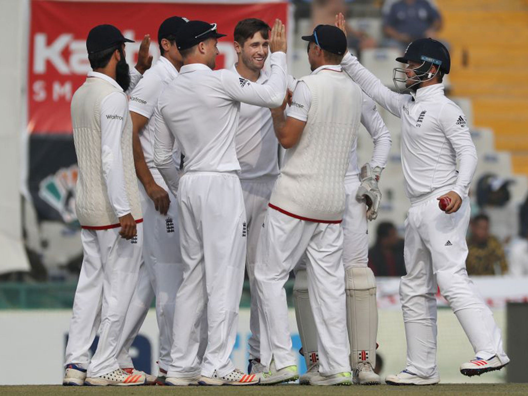 Chris Woakes struck in his first over to dismiss Murali Viya and give England hope