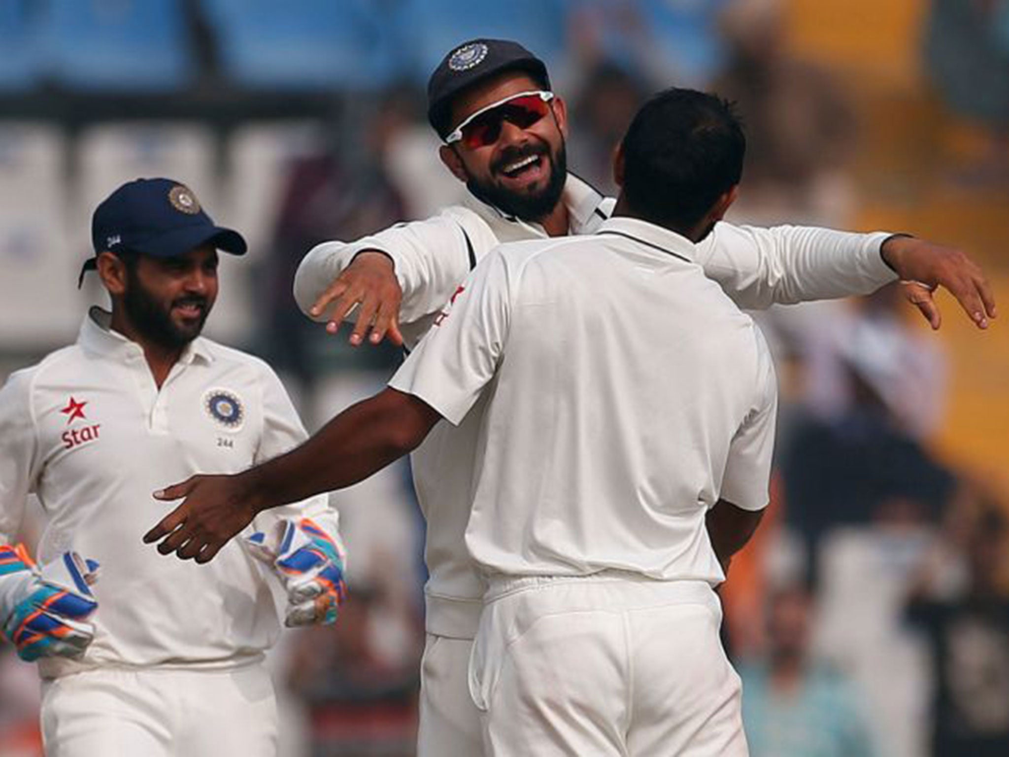 Virat Kohli celebrates during India's eight-wicket victory over England in the third Test