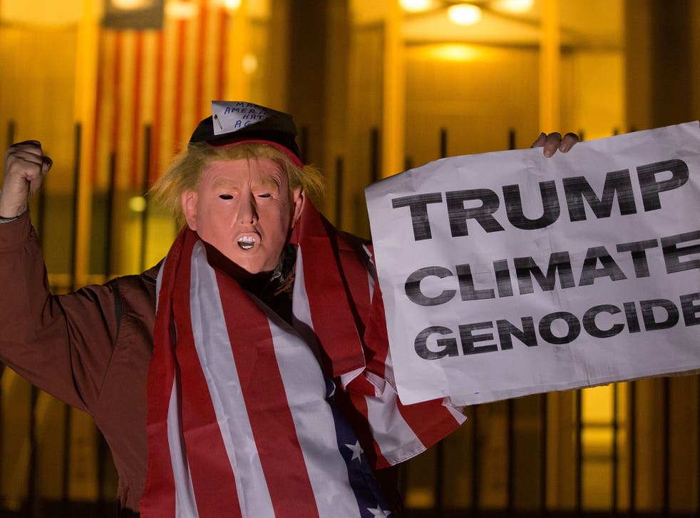 Protestors demonstrate outside US embassy in London in response to Trump's vow to withdraw from Paris Agreement