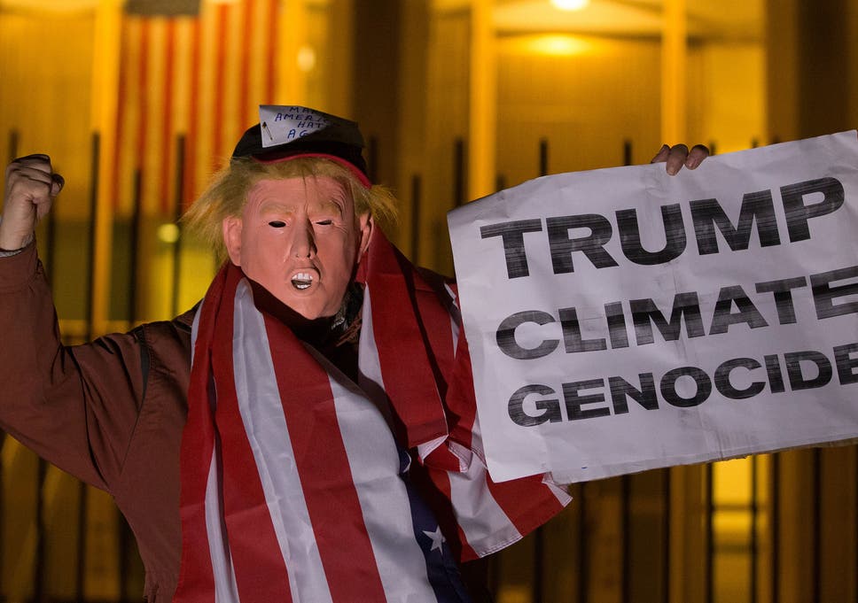 Protestors demonstrate outside US embassy in London in response to Trump's vow to withdraw from Paris Agreement