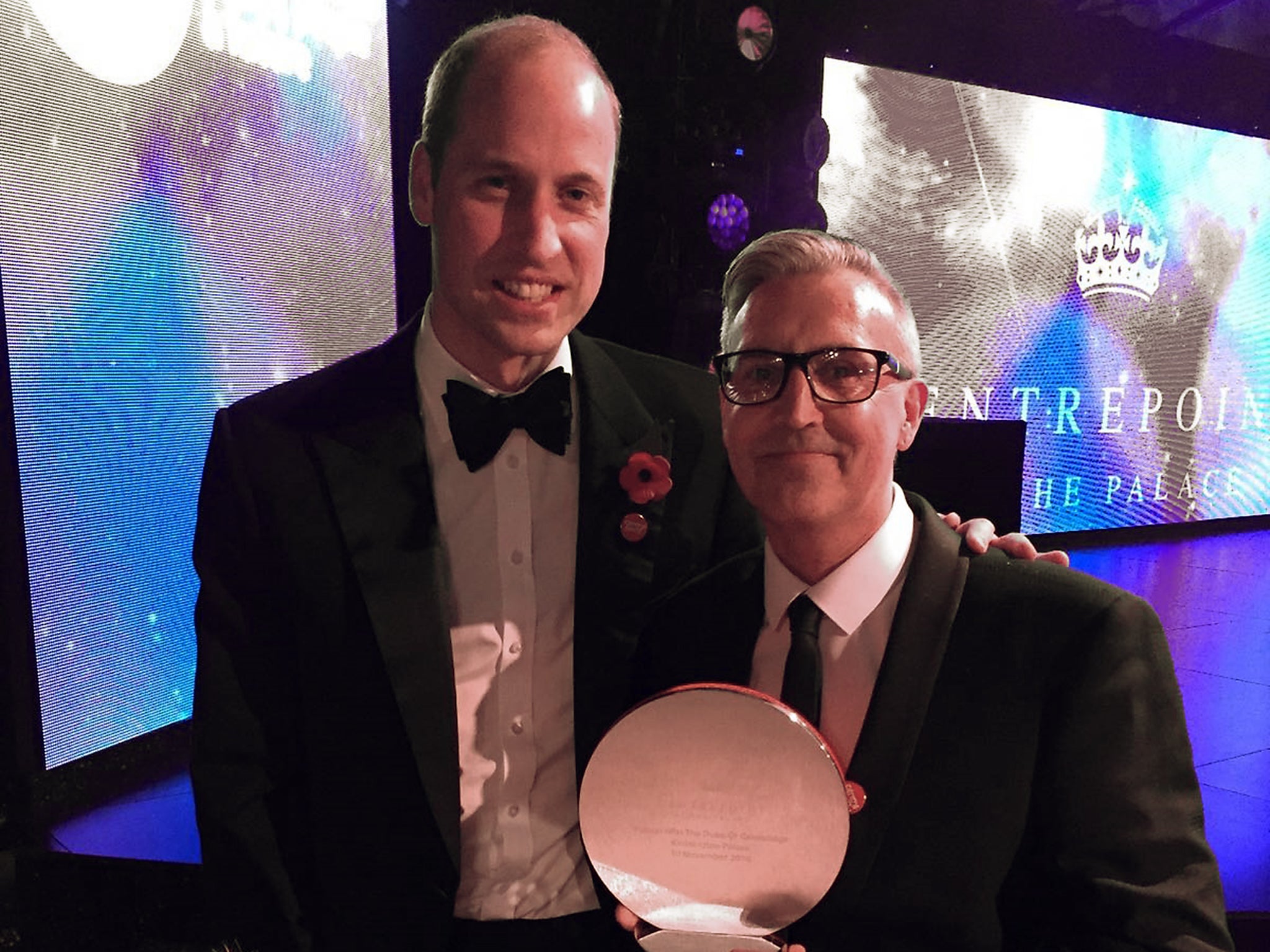 Matt Carlisle receiving his Contribution to Society Award from Prince William at a ceremony held at Kensington Palace in November