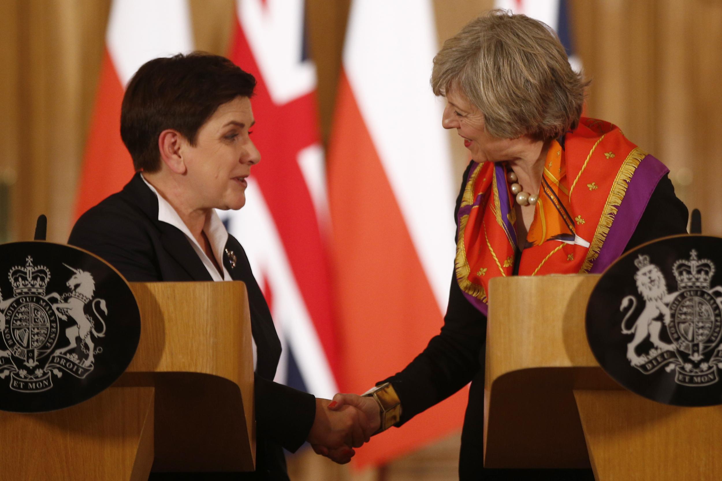 Britain's Prime Minister Theresa May (R) and her Polish counterpart Beata Szydlo hold a joint news conference in 10 Downing Street in central London, Britain November 28, 2016