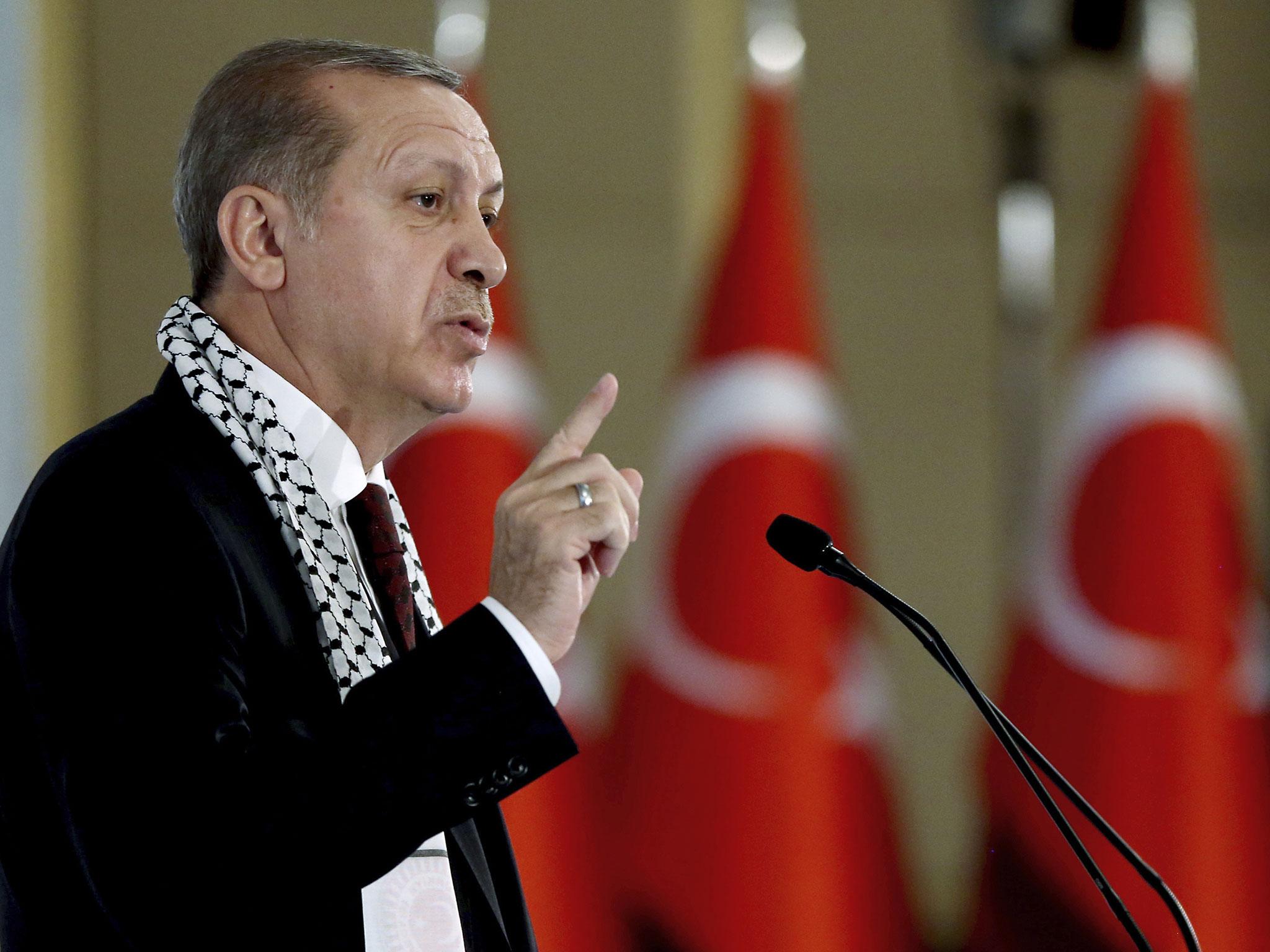 Turkey's President Erdogan maintains the country's forces were in Syria 'to bring justice'