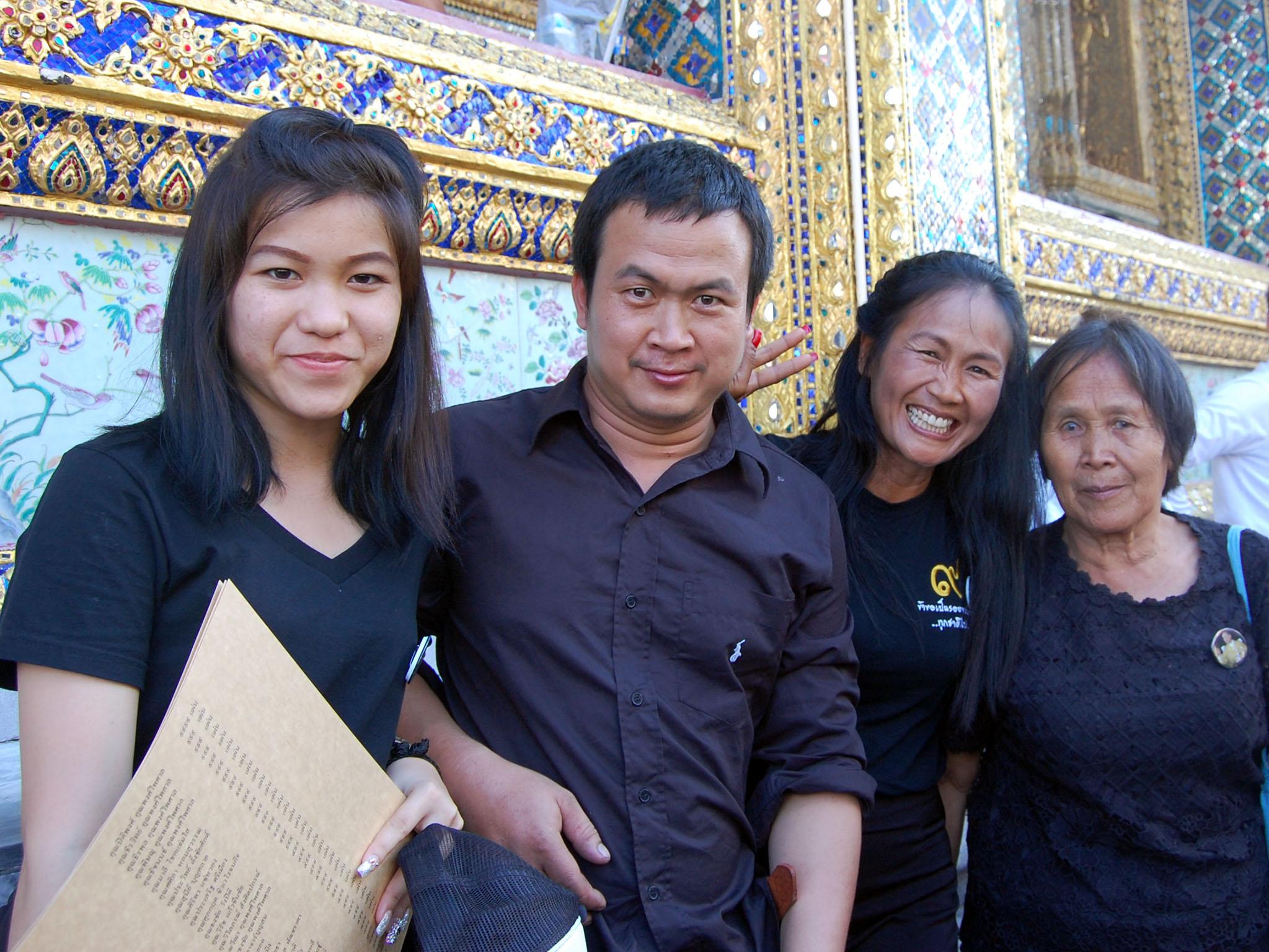 Kanyarat Butbrom, third from the left, came to the Grand Palace with her family to honour the beloved king