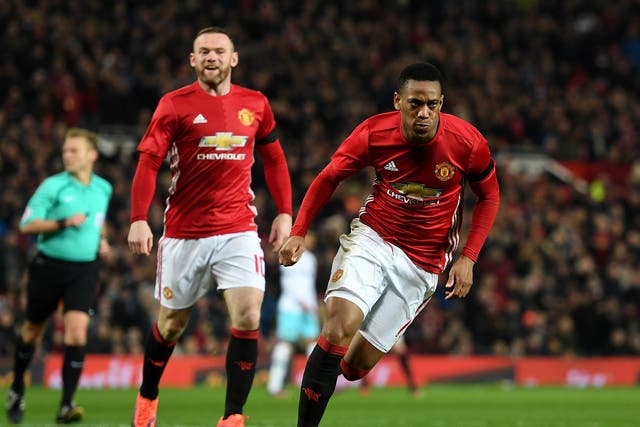 Martial wheels away after restoring United's lead