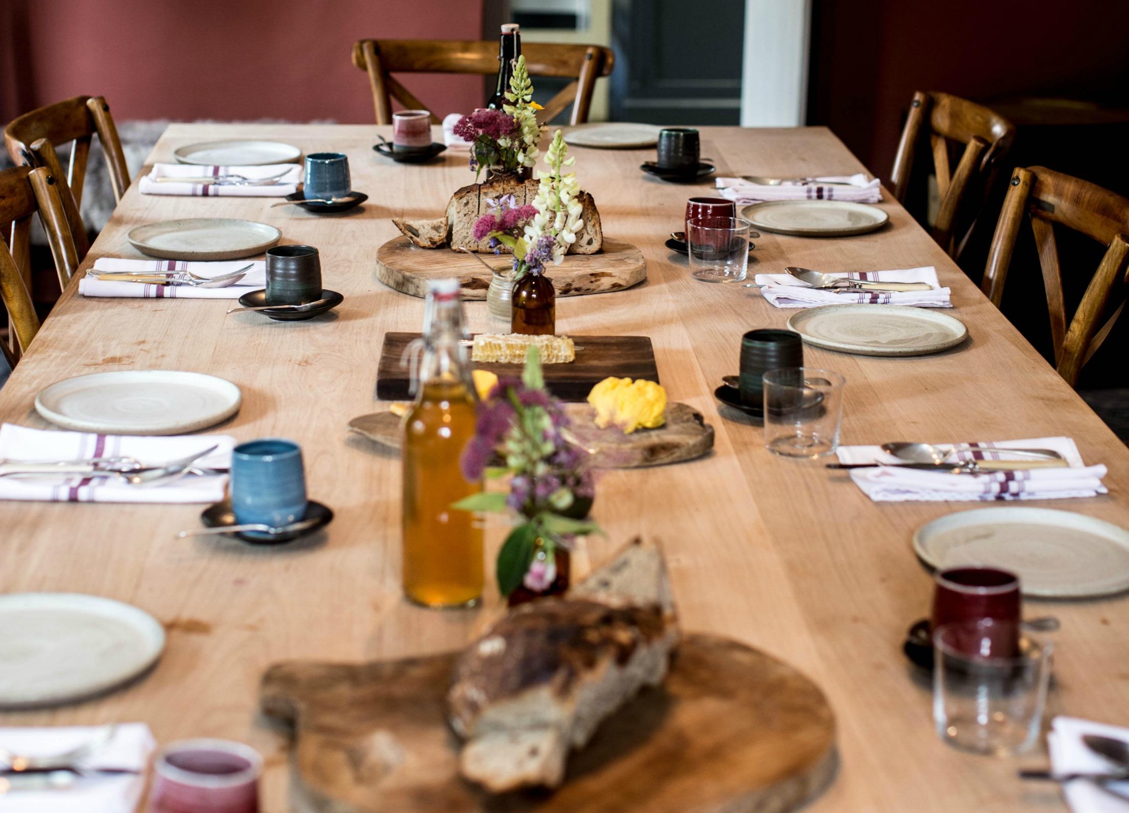 The communal dining table in the farmhouse