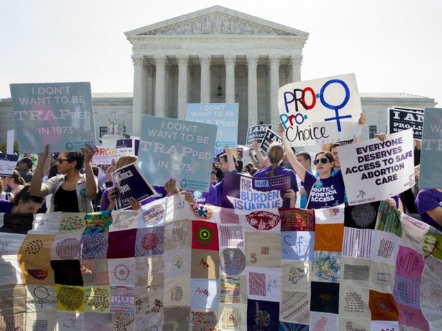 Pro-choice supporters rally outside the Supreme Court before the June 2016 court ruling in a case that imposed heavy restrictions on abortion clinics in Texas and was struck down