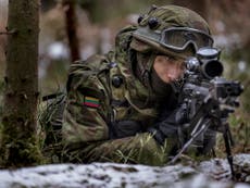 Lithuanians take extreme survival training for 'Russian invasion'