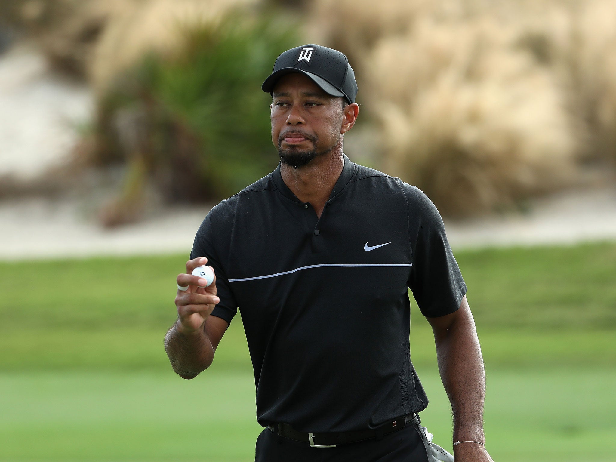 Tiger Woods made his return to competitive golf on Thursday after 16 months out with a back injury