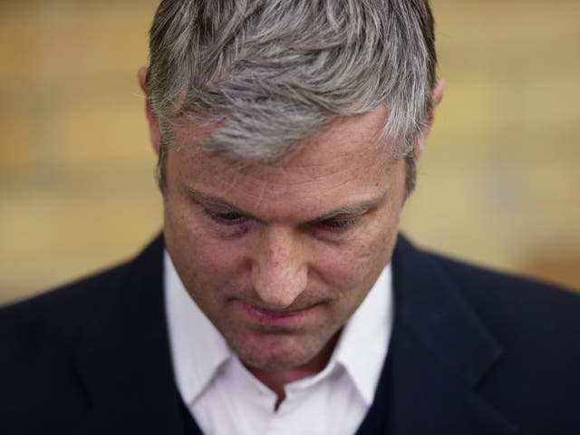 Zac Goldsmith looking dejected whilst listening to newly-elected Liberal Democrat MP Sarah Olney speaking, during the Richmond Park by-election in Richmond upon Thames College