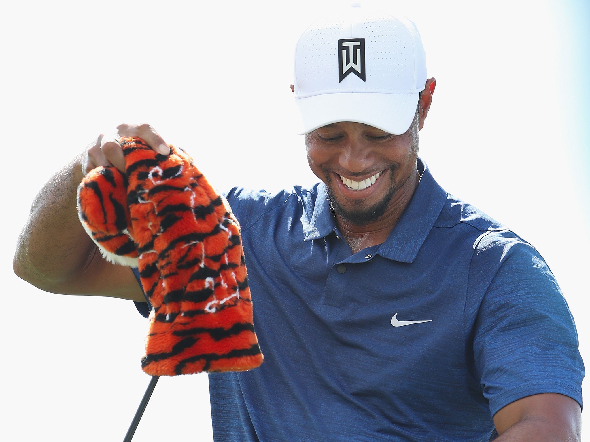 Woods even afforded himself a smile towards the end of his round