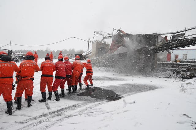 Rescuers work to try and free any surviving trapped miners in Heilongjiang