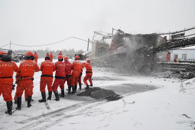 Rescuers work to try and free any surviving trapped miners in Heilongjiang