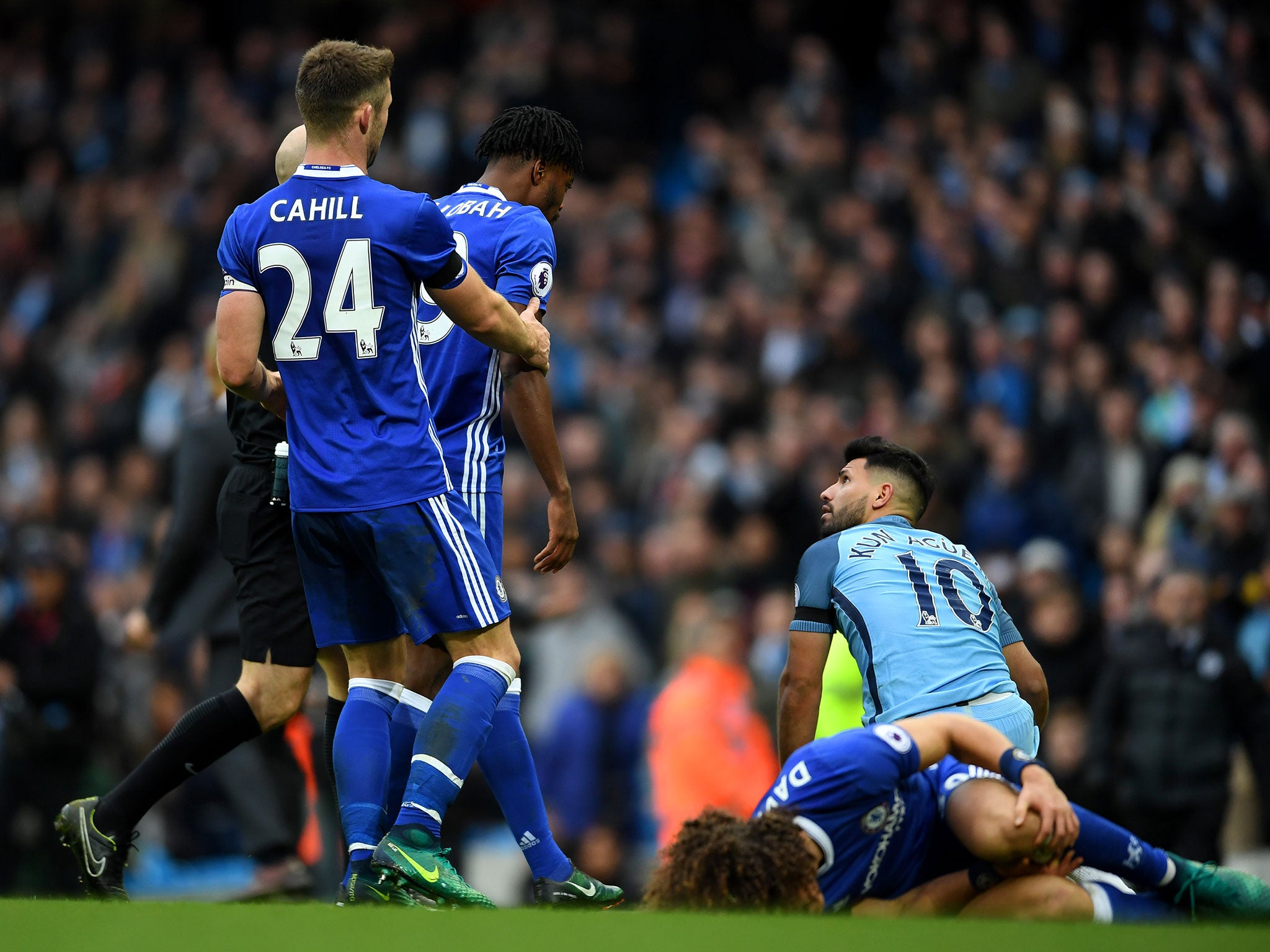 Chelsea's players rush to confront Aguero after his dangerous tackle on David Luiz