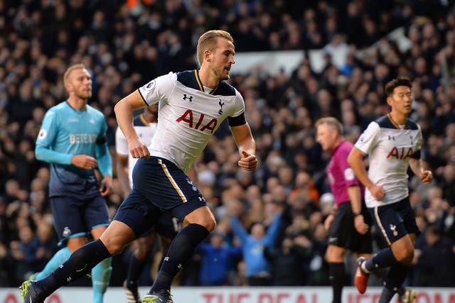 Harry Kane wheels away to celebrate after converting from the penalty spot