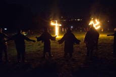 Ku Klux Klan supporters do Nazi salutes at rally in honour of Trump