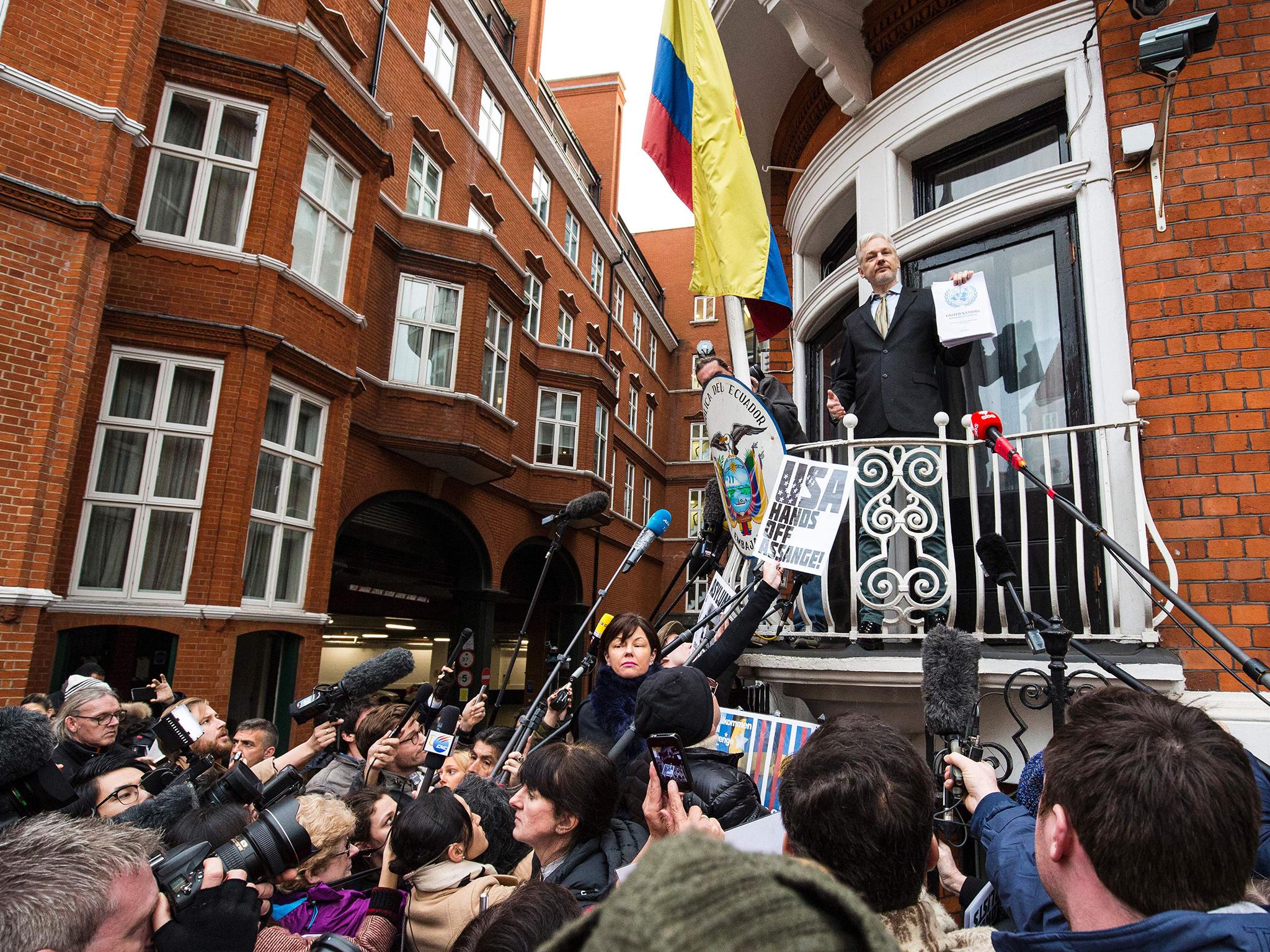 Julian Assange addresses the media from the balcony of Ecuador's UK embassy