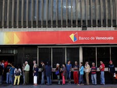 Venezuela to reissue currency as value of biggest banknote drops to 2p