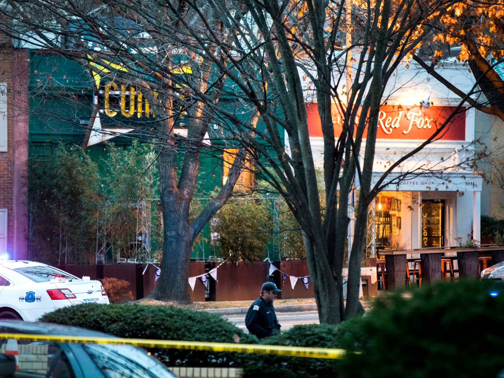 Police surround Comet Ping Pong after a man with an assault rifle entered the restaurant in Washington, D.C. (Jim Lo Scalzo/EPA)