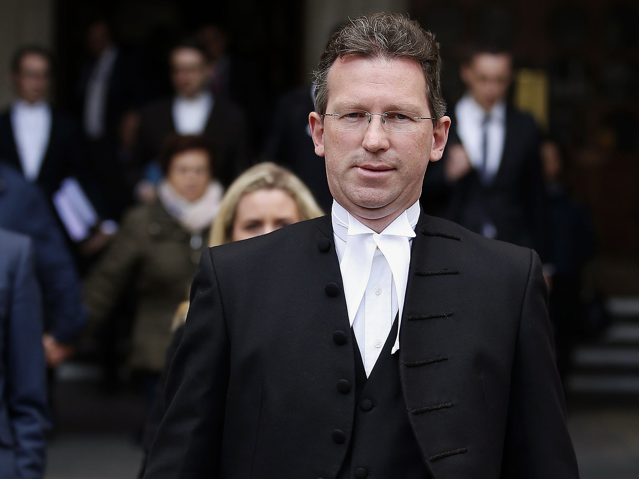 Britain's Attorney General Jeremy Wright leaves the Royal Courts of Justice