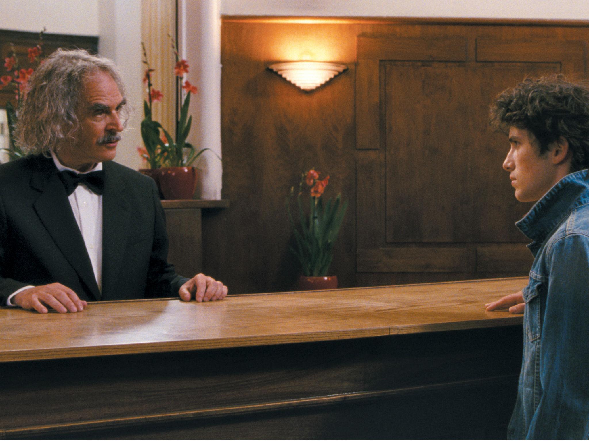 The director (left) has a cameo as a hotel concierge in his film which stars Victor Ezenfis as a disgruntled teenager, Vincent