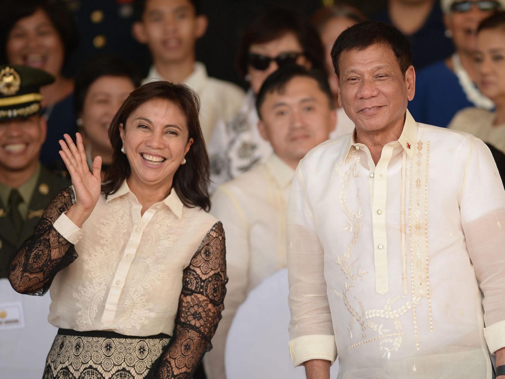 Vice President Leni Robredo with President Rodrigo Duterte, who she admits she has had 'differences' with