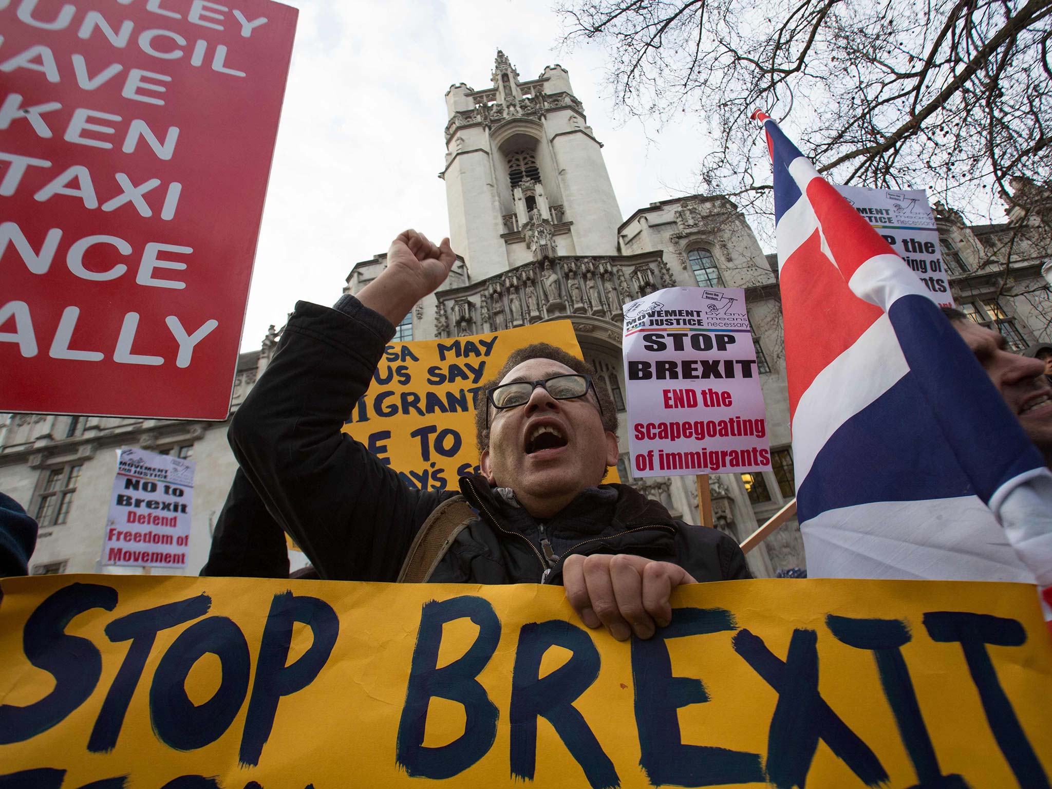 Anti-Brexit demonstrators protest outside the Supreme Court in London yesterday